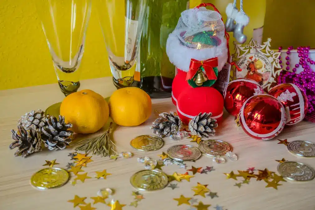 new year background with toy champagne tangerines christmas celebration