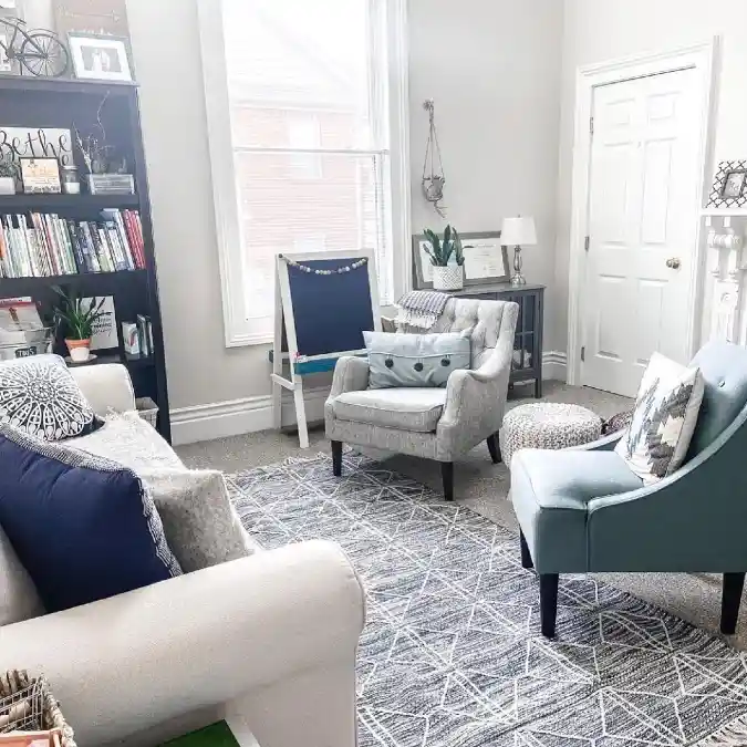 16 Budget-Friendly therapy office decor ideas for Private Practice 11 Define Your Space with Cozy Textiles and Varied Seating