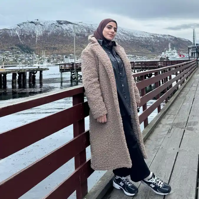 17 Chic Winter Business Casual Outfits for Women over 40 9 Textured Teddy Coat Layer